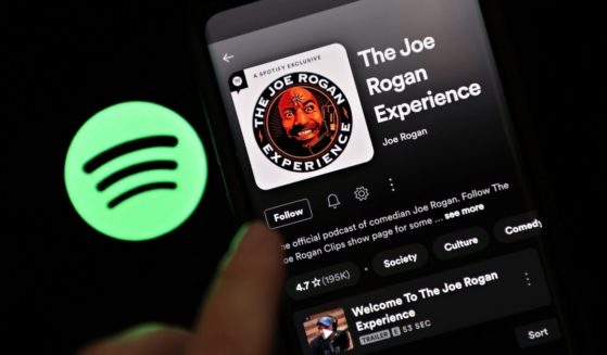"The Joe Rogan Experience" podcast is viewed on Spotify's mobile app on Jan. 31 in New York City.
