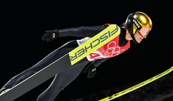 Germany's Katharina Althaus participates in the first round of the women's ski jumping normal hill Individual competition during the Beijing Winter Olympics on Saturday at the Zhangjiakou National Ski Jumping Center.