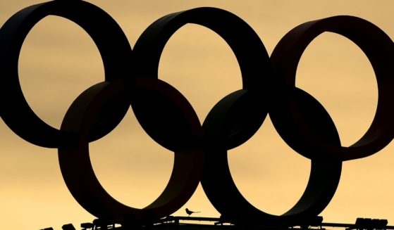 The Olympic rings are seen during the 2022 Beijing Winter Olympics on Monday in Beijing.