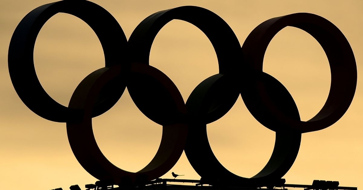 The Olympic rings are seen during the 2022 Beijing Winter Olympics on Monday in Beijing.