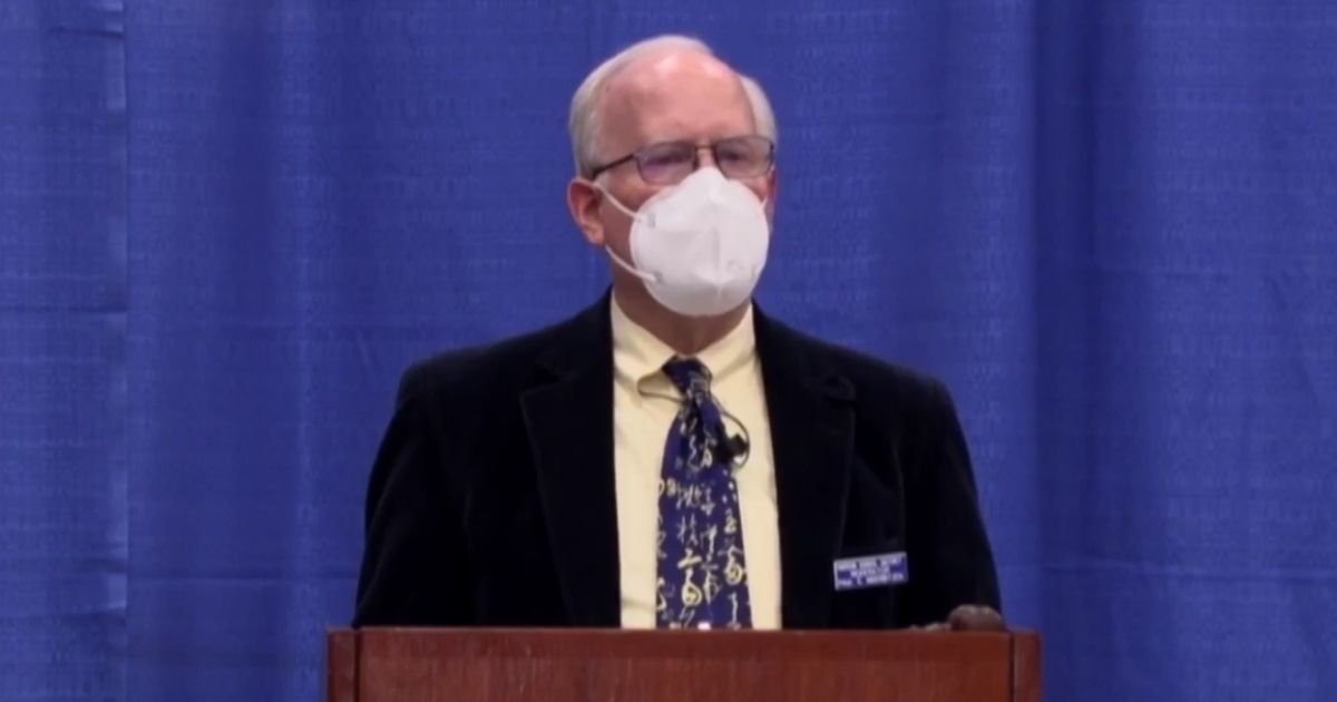 Hudson, New Hampshire, town moderator Paul Inderbitzen ordered parents without face masks to move to the back of the room during a school board meeting on Saturday.