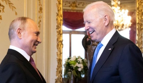 Russian President Vladimir Putin, left, and his U.S. counterpart, Joe Biden, share a laugh as they meet for a summit at Villa La Grange in Geneva, Switzerland, on June 16, 2021.