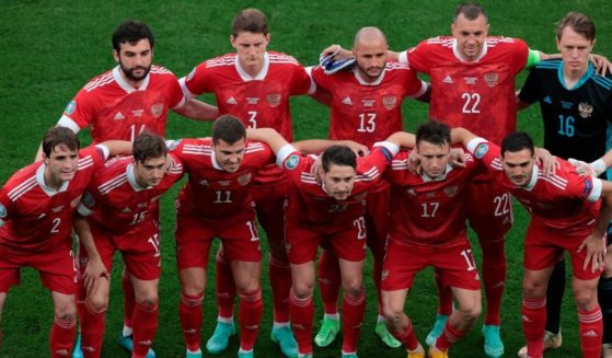 Starting players for the Russian soccer team pose for a photo before the start of the Euro 2020 soccer championship group B match between Russia and Denmark in Copenhagen, Denmark, on June 21, 2021.