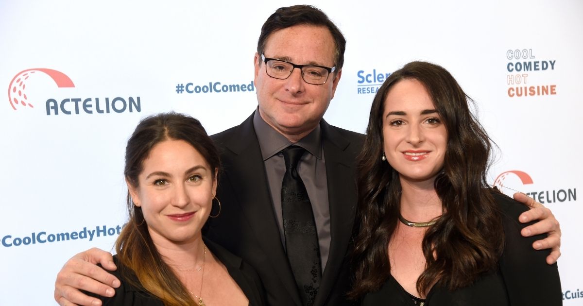 Bob Saget, center, is pictured with his daughters Aubrey, left, and Lara, right, at the 30th annual Scleroderma Foundation Benefit in Beverly Hills, California on June 16, 2017.