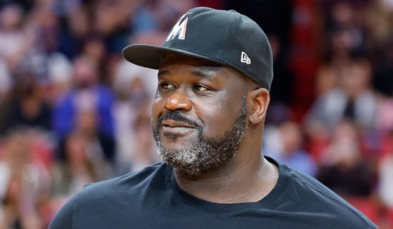 NBA legend Shaquille O'Neal looks on during the game between the Miami Heat and the Philadelphia 76ers at FTX Arena in Miami on Jan. 15.