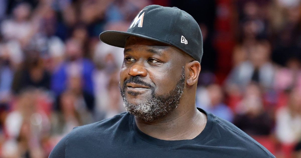 NBA legend Shaquille O'Neal looks on during the game between the Miami Heat and the Philadelphia 76ers at FTX Arena in Miami on Jan. 15.