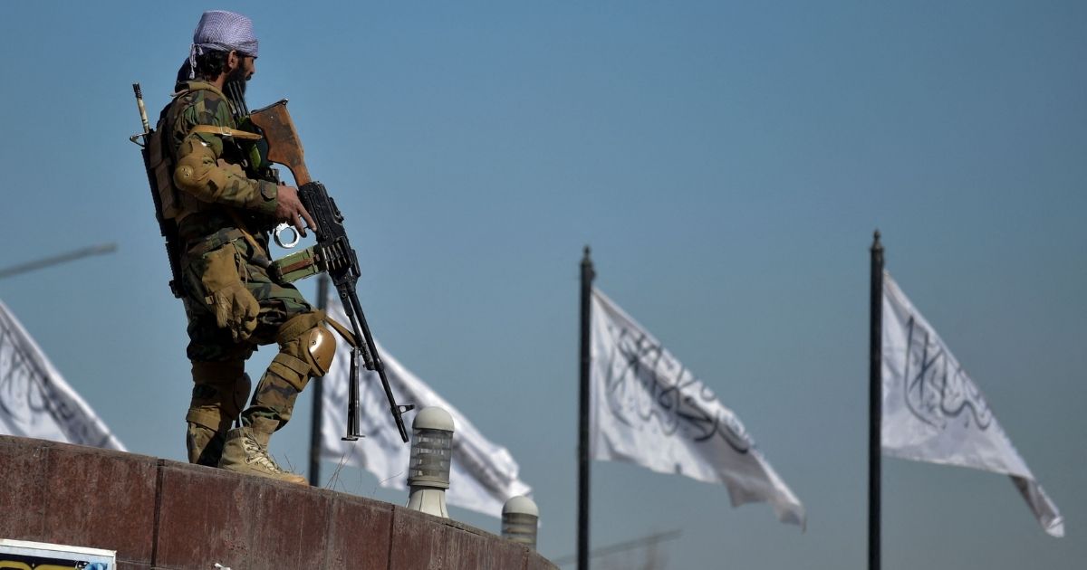 A Taliban fighter stands guard in front of the U.S. embassy in Kabul, Afghanistan, on Jan. 26.