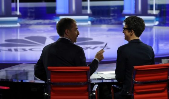 Moderators Rachel Maddow of MSNBC and Chuck Todd of NBC News talk during a Democratic presidential debate in Miami on June 27, 2019.