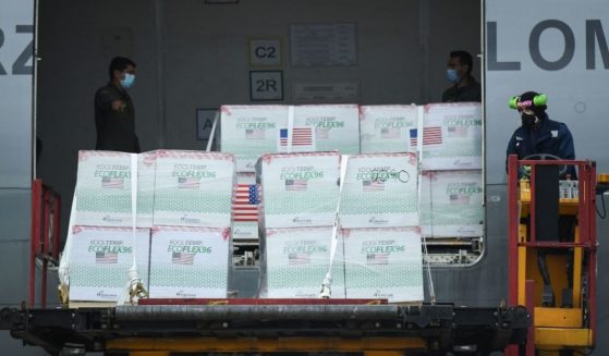 Members of the Colombian Air Force unload 2.5 million doses of the Johnson & Johnson vaccine in Bogota in July.