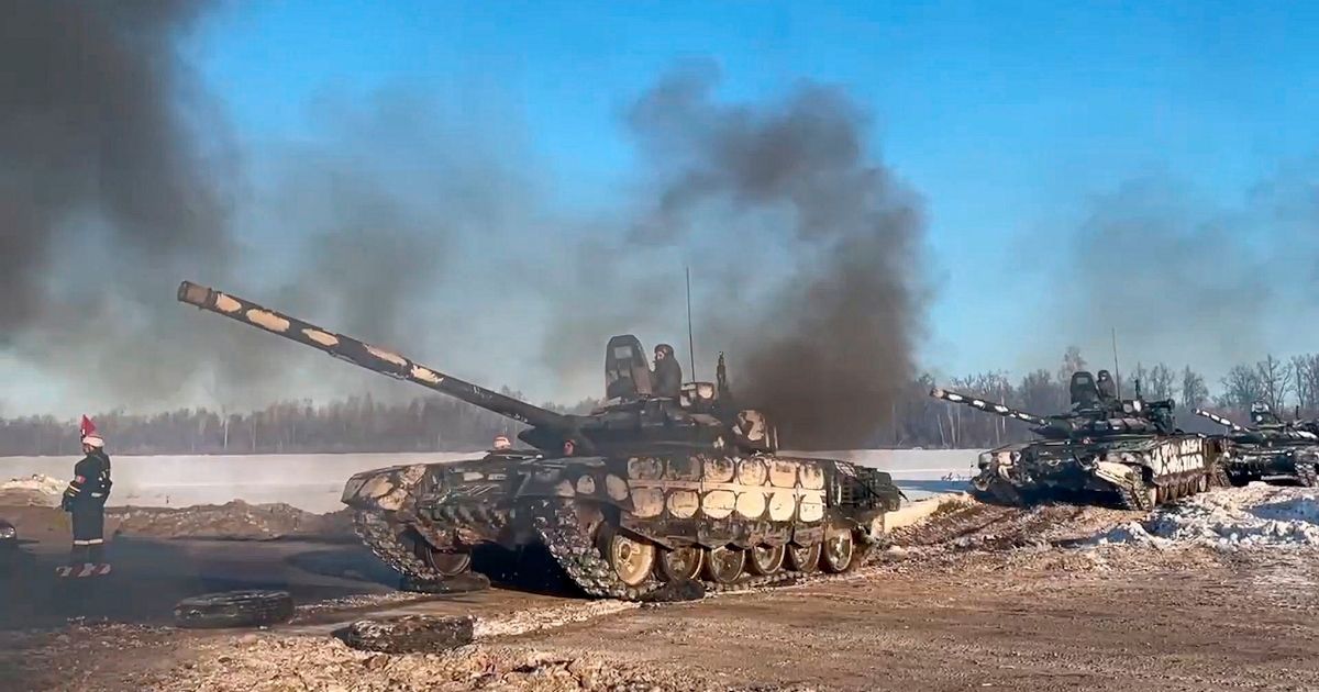 Russian army tanks move back to their permanent base after drills near the Russia-Ukraine border in a photo taken from video provided by the Russian Defense Ministry Press Service on Tuesday.