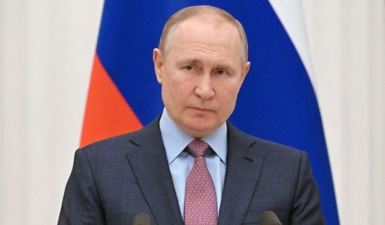 Russian President Vladimir Putin attends a news conference at the Kremlin in Moscow on Feb. 18.