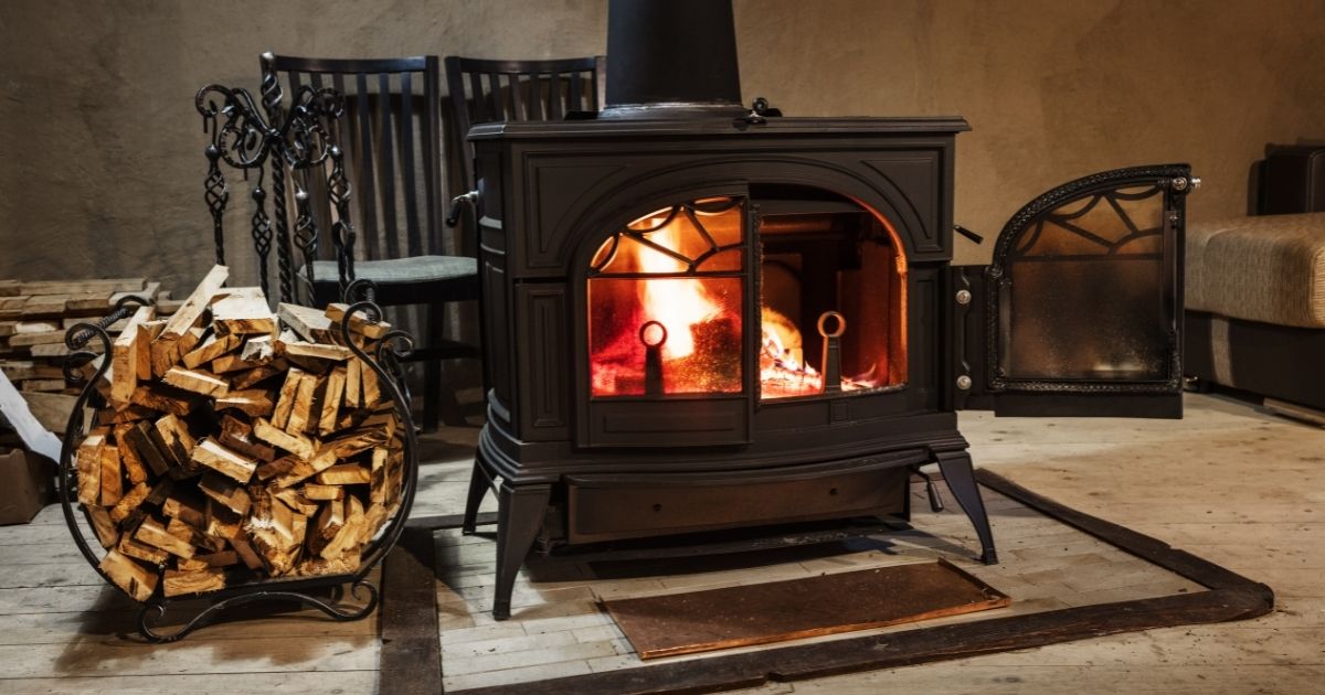 A wood-burning stove generates warmth in a country home.
