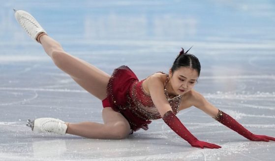 Zhu Yi, a figure skater for the Chinese Olympic team who was born an American citizen, fell for a second day in a row during the free skate program on Monday.