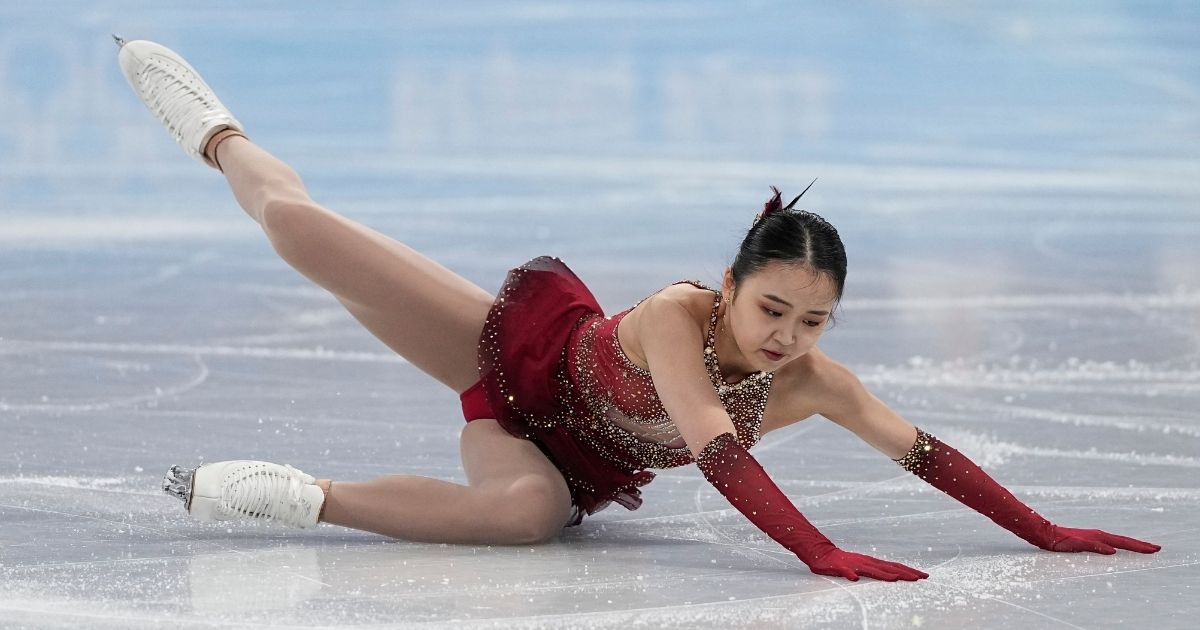 Zhu Yi, a figure skater for the Chinese Olympic team who was born an American citizen, fell for a second day in a row during the free skate program on Monday.