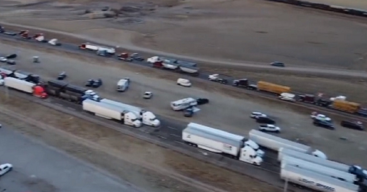 An aerioal view of a truck convoy blocking the border crossing from Alberta, Canada, to the U.S. at Sweet Grass Montana.