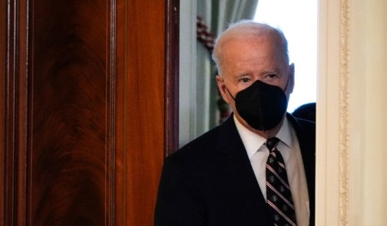 President Joe Biden arrives to deliver remarks on developments in Ukraine and Russia, and announces sanctions against Russia, from the East Room of the White House on Tuesday.