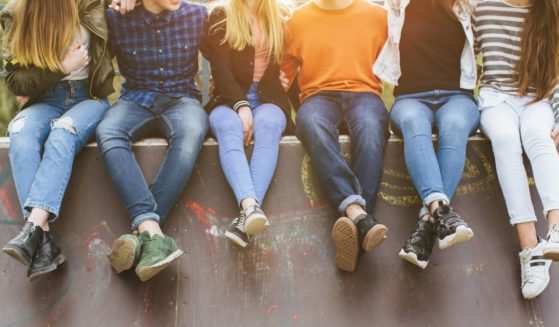 A group of teenagers is seen in this stock image.