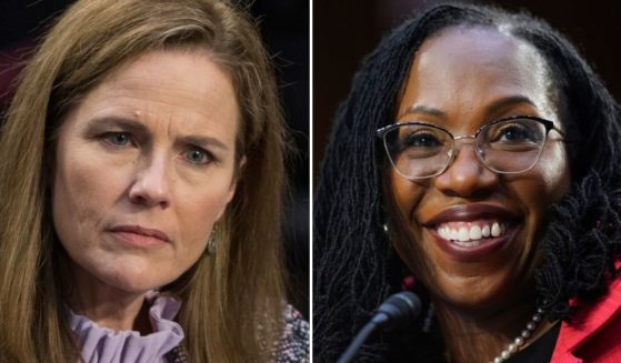 Supreme Court Justice Amy Coney Barrett, left, was treated with contempt by Democrats and had protests surrounding her confirmation hearings in 2020. Supreme Court nominee Ketanji Brown Jackson, right, was smiling during her confirmation hearing on Wednesday, facing what appears to be far less controversy and contempt.