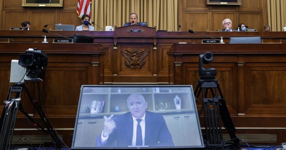 Amazon CEO Jeff Bezos testifies via video conference during a House Judiciary Subcommittee hearing in July of 2020. The bipartisan House committee has sent a letter alerting the Department of Justice to 'potentially criminal conduct' by Amazon officials during its 2020 antitrust probe.