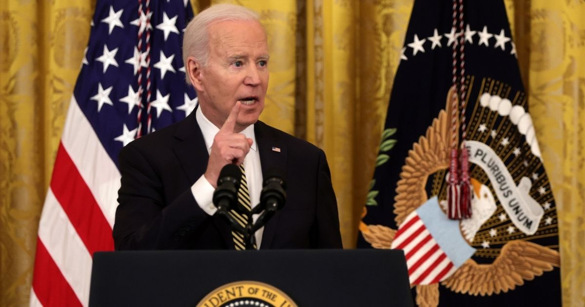President Joe Biden attempts to explain new legislation regarding internet 'revenge porn; Wednesday in Washington.