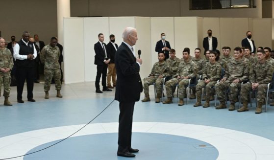 President Joe Biden talks to service members from the 82nd Airborne Division during his visit to Poland Friday.
