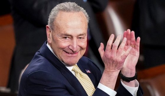 Senate Majority Leader Chuck Schumer claps during President Joe Biden's State of the Union address during a joint session of Congress at the Capitol in Washington on March 1.