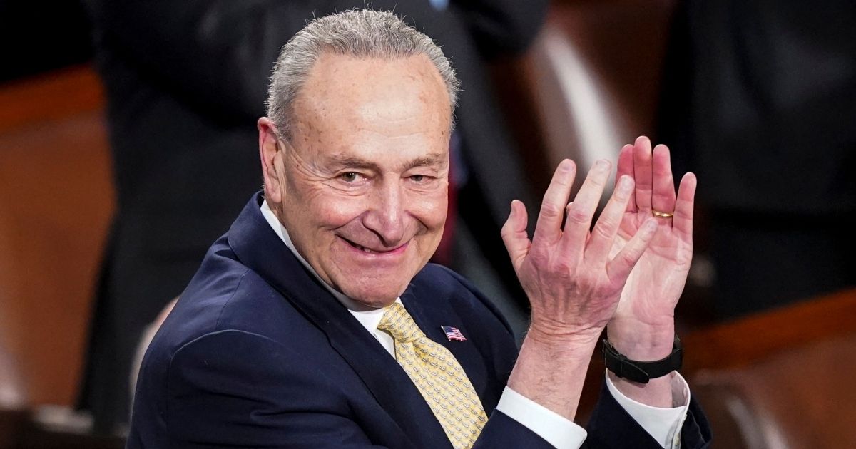 Senate Majority Leader Chuck Schumer claps during President Joe Biden's State of the Union address during a joint session of Congress at the Capitol in Washington on March 1.