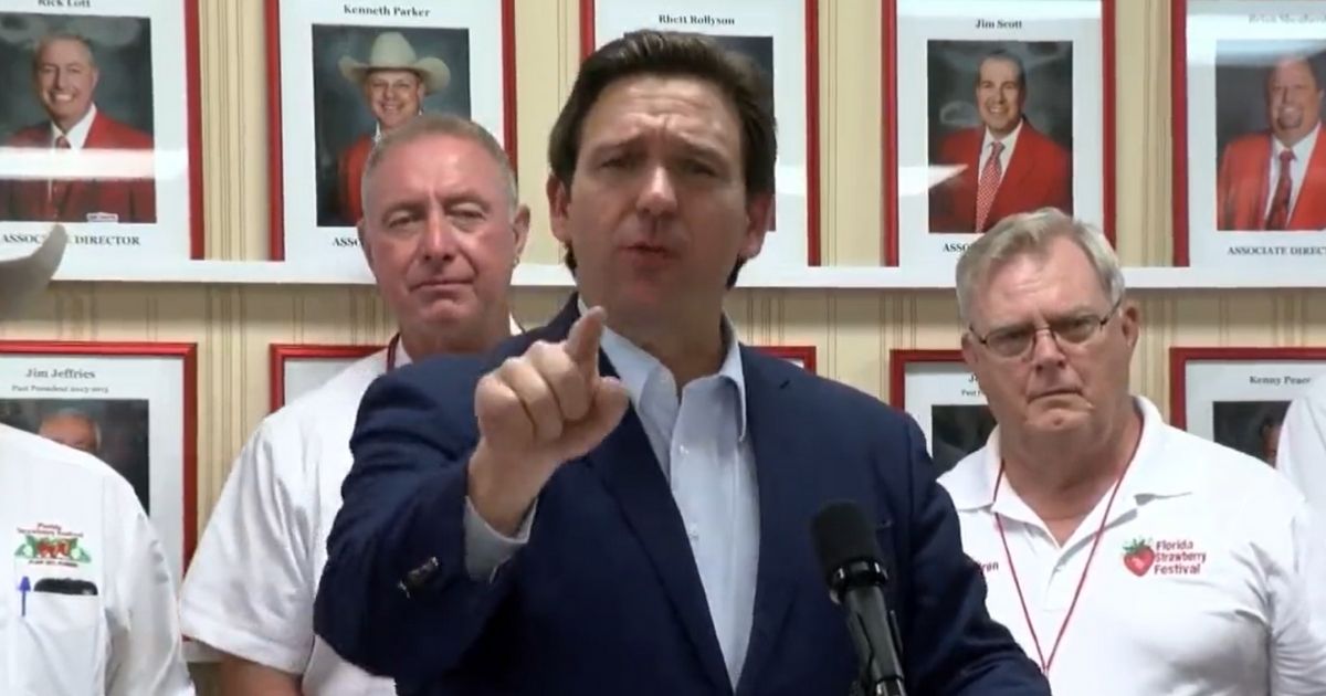 Florida Gov. Ron DeSantis responds to a question about parents' rights legislation on Monday.
