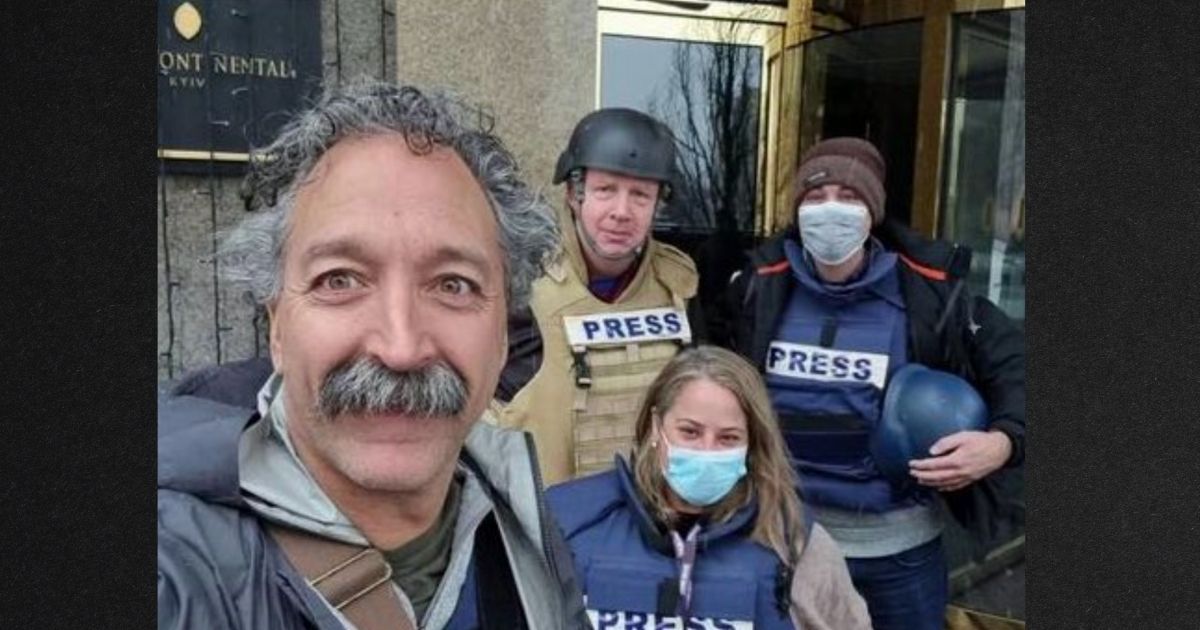 Veteran Fox News cameraman Pierre Zakrzewski, foreground, was killed while covering the war in Ukraine this week, along with Ukranian colleague Oleksandra Kuvshynova, center background, when the vehicle they were riding in was struck by incoming fire. Reporter Benjamin Hall was injured in the same attack and was hospitalized.