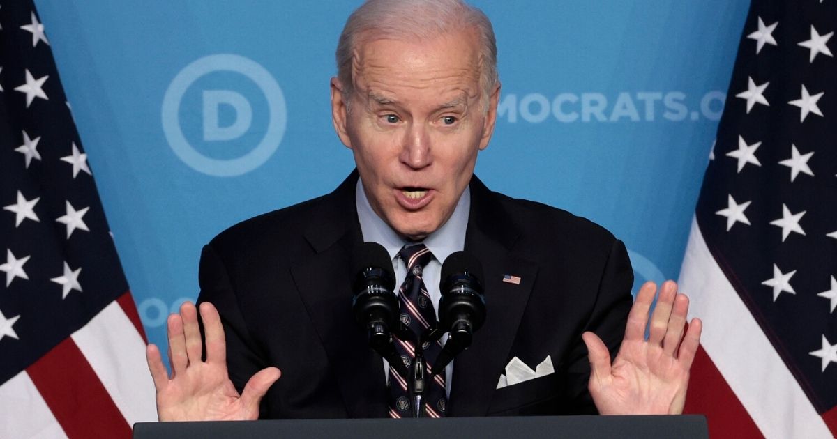 President Joe Biden speaks at the Democratic National Committee's winter meeting at the Washington Hilton Hotel in D.C. on Thursday.
