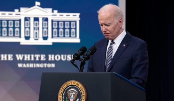 President Joe Biden listens to questions from reporters after giving remarks from the South Court Auditorium of the White House on Thursday in Washington, D.C.