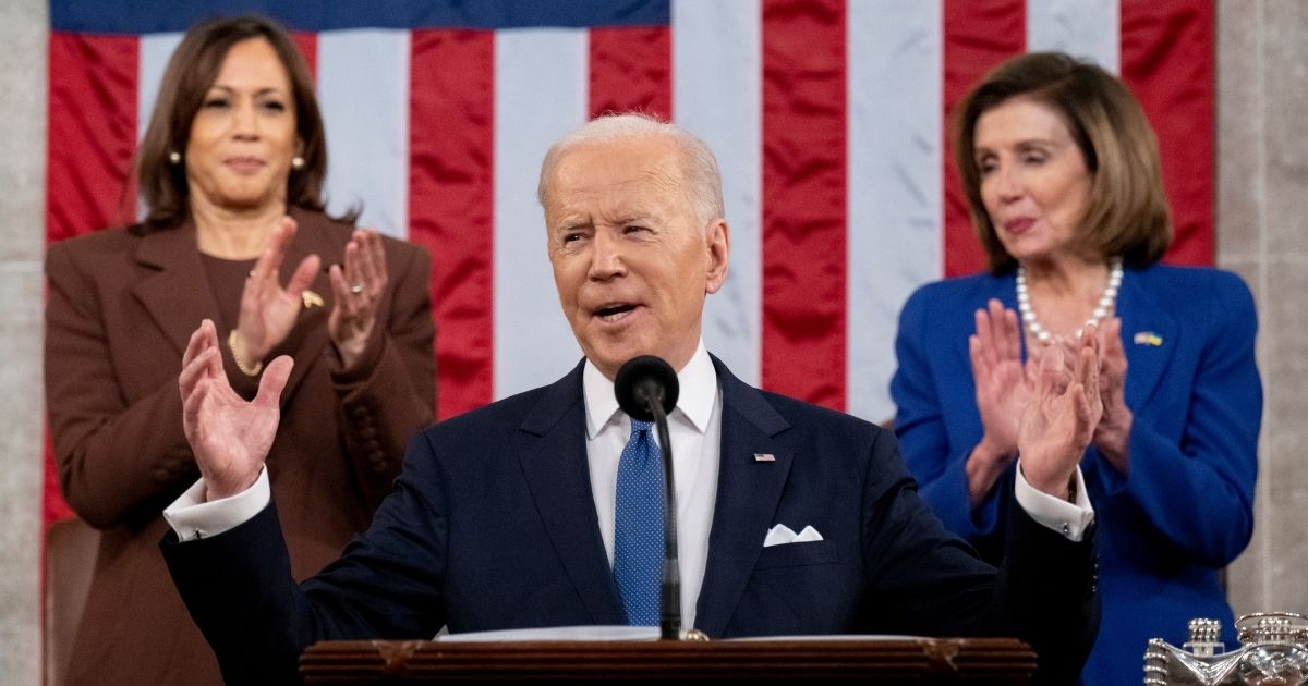 President Joe Biden delivers the State of the Union address as Vice President Kamala Harris, left, and House Speaker Nancy Pelosi look on at the U.S. Capitol in Washington on Tuesday.