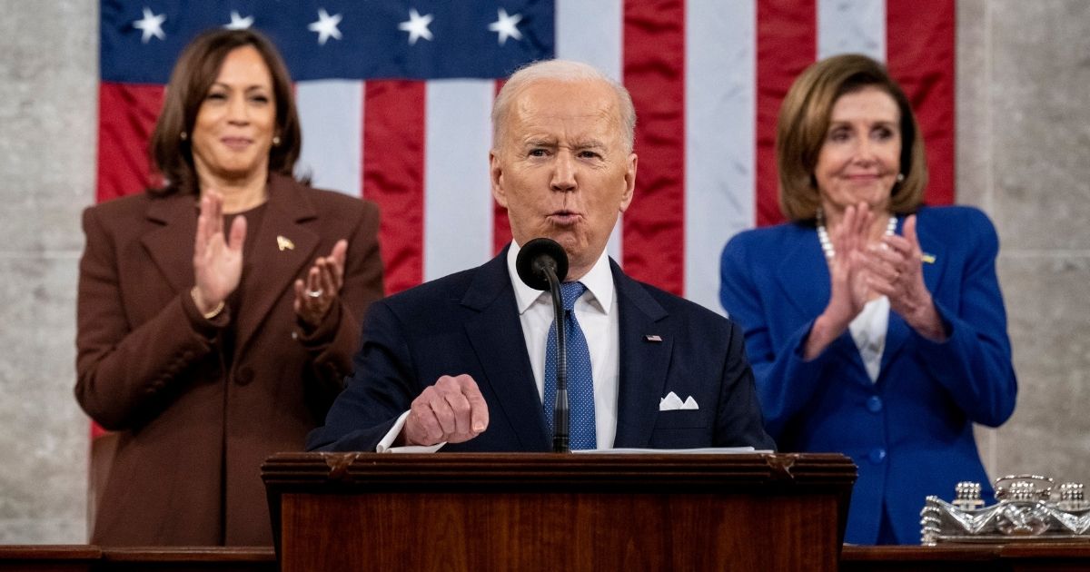 Vice President Kamala Harris, left, and House Speaker Nancy Pelosi applaud as President Joe Biden delivers the State of the Union address during a joint session of Congress at the Capitol in Washington on Tuesday.