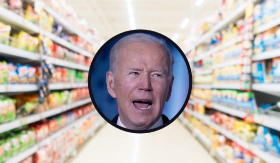 A grocery store aisle is seen in the above stock image. President Joe Biden delivers a speech in Warsaw, Poland, on Saturday.