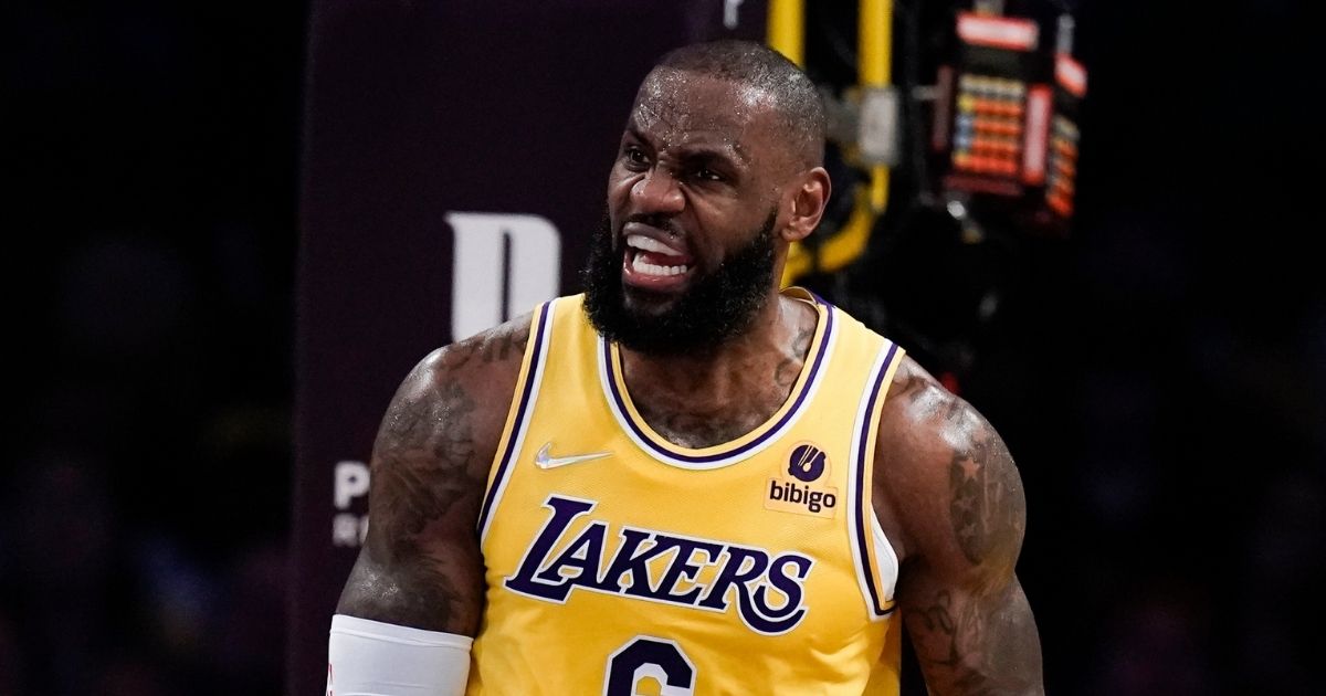 During Monday's NBA game against the Toronto Raptors, Los Angeles Laker's player LeBron James reacts negatively to a foul call against him in the first half.
