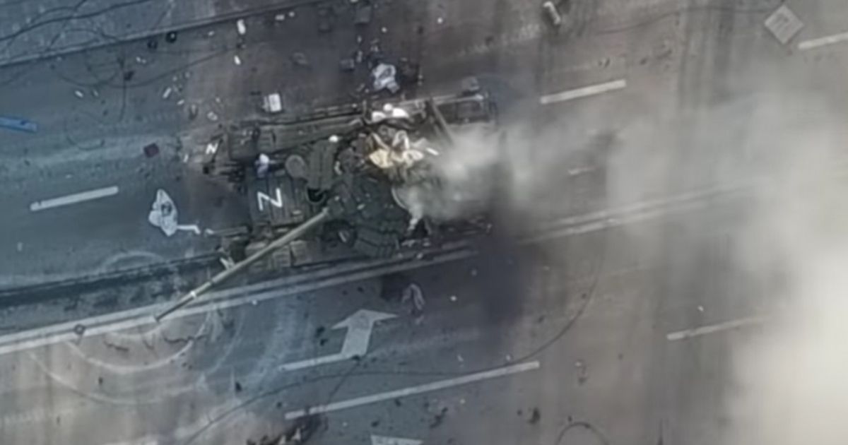 Drone footage shows the tank taking repeated hits as the crew attempted to scramble out of it.