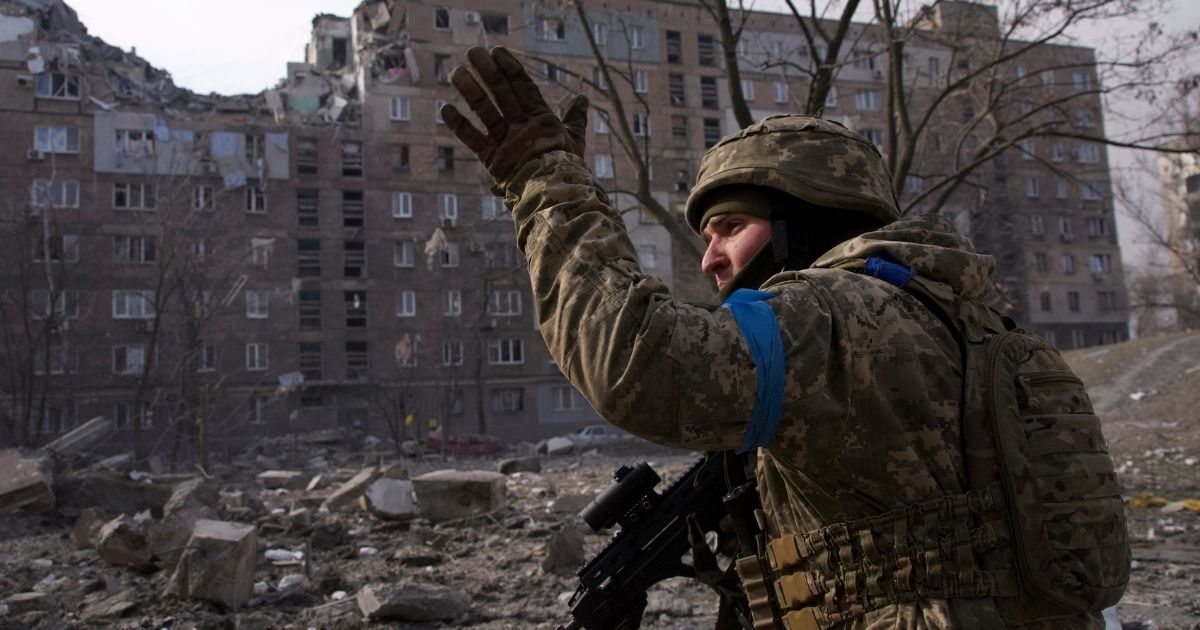 On March 12, a Ukrainian serviceman defends his position in Mariupol, Ukraine.