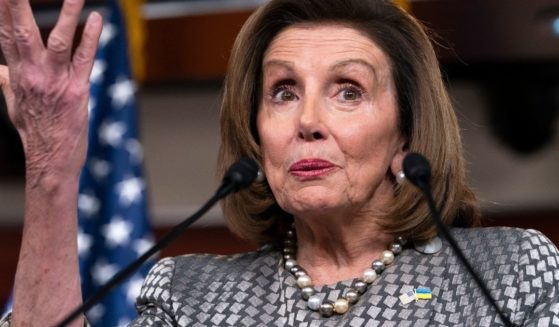 Speaker of the House Nancy Pelosi talks to reporters from Capitol Hill on Thursday. Pelosi spoke out against GOP Rep. Lauren Boebert of Colorado for her remarks during President Joe Biden's State of the Union address on Tuesday.