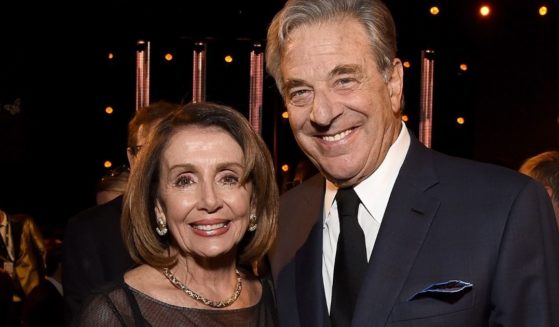 House Speaker Nancy Pelosi and her husband, Paul Pelosi, pose during an event at the Los Angeles Convention Center on Feb. 8, 2019.