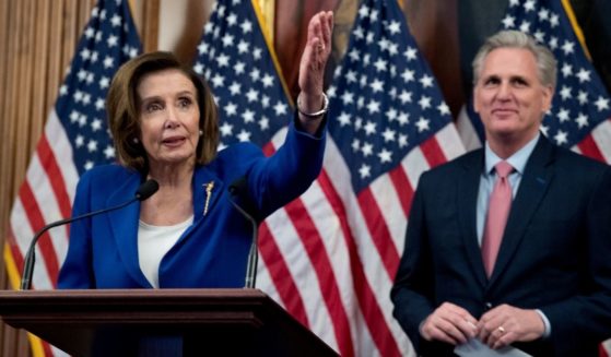 House Speaker Nancy Pelosi and House Minority Leader Kevin McCarthy appear together at the Capitol in Washington on March 27, 2020, after the House passed a $2.2 trillion coronavirus relief package.