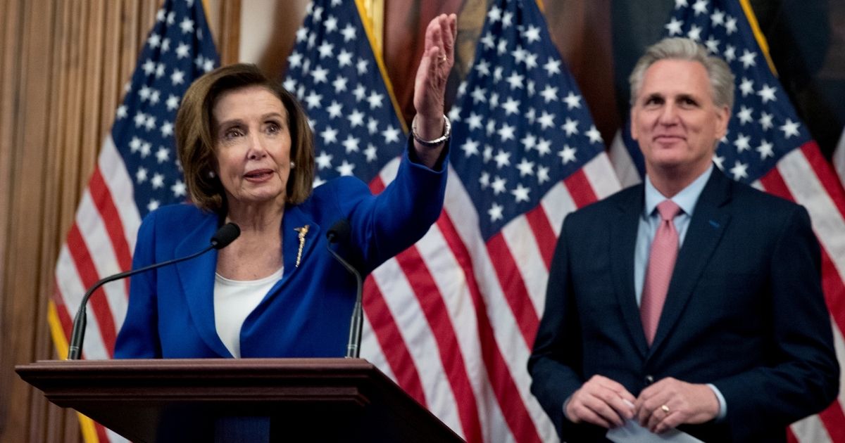House Speaker Nancy Pelosi and House Minority Leader Kevin McCarthy appear together at the Capitol in Washington on March 27, 2020, after the House passed a $2.2 trillion coronavirus relief package.