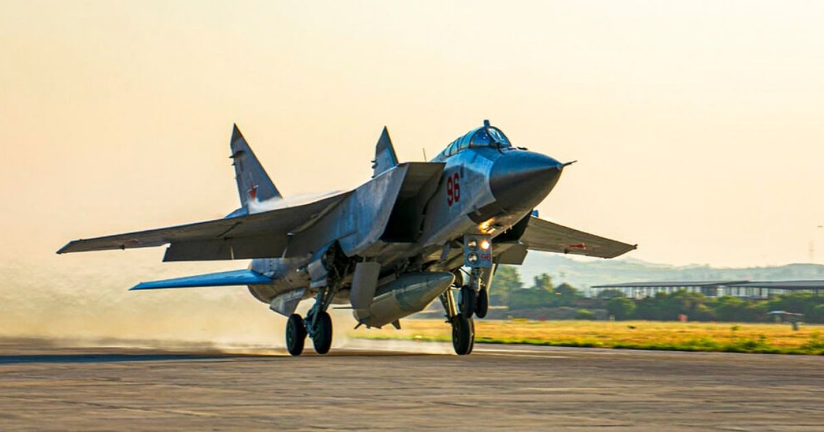 A Russian MiG-31 fighter jet carrying a Kinzhal missile is seen in a file photo from June 2021. A Russian diplomat warned Saturday that US and NATO convoys taking arms to Ukraine could be viewed as targets of war.