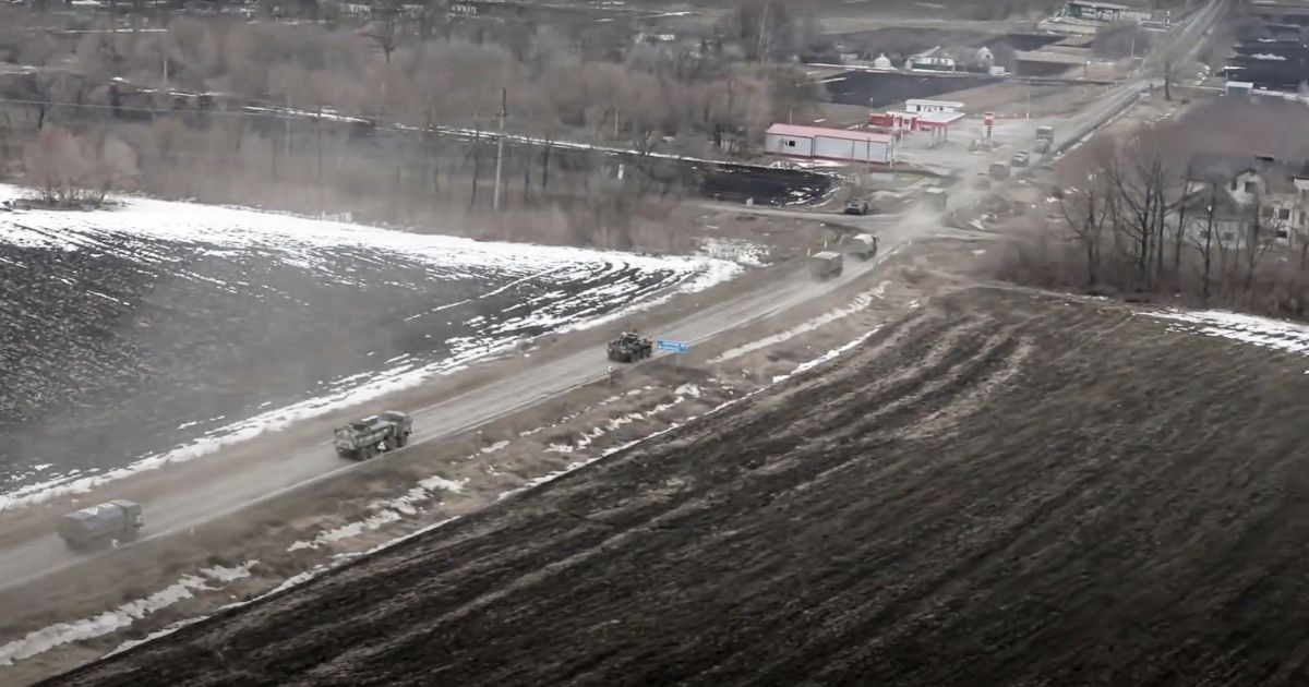 A Russian military helicopter took aerial footage of Russian military vehicles moving through an undisclosed location in Ukraine on March 3.