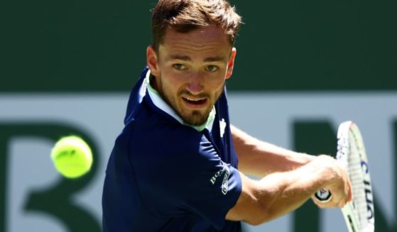 Daniil Medvedev of Russia plays a backhand against Gael Monfils of France in their third-round match of the BNP Paribas Open at the Indian Wells Tennis Garden in Indian Wells, California, on Monday.
