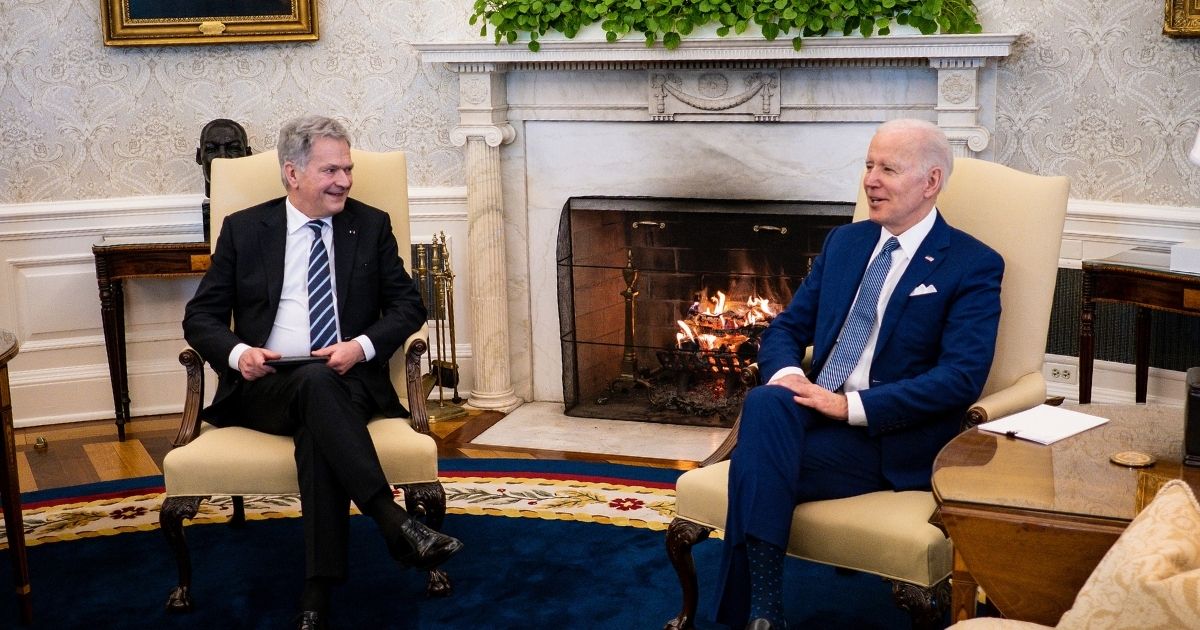 U.S. President Joe Biden, right, meets with Finnish President Sauli Niinistö in the Oval Office of the White House on Friday in Washington, D.C.