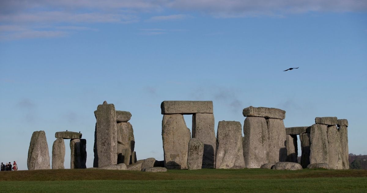 Visitors took a photograph of Stonehenge, a prehistoric monument in Wiltshire, England, and one of the oldest structures in the world.