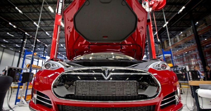 An electric car is seen on an assembly line at the Tesla factory in Tilburg, the Netherlands, on Aug. 22, 2013.