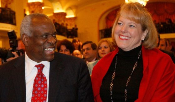 Supreme Court Justice Clarence Thomas shares a laugh with his wife, Virginia "Ginny" Thomas, in Washington on Nov. 15, 2007.