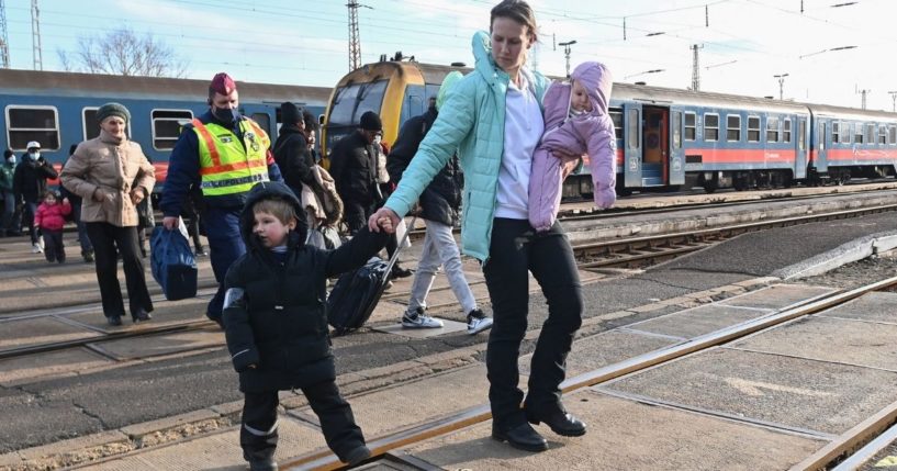 Ukraine refugees arrive at the railway station in the Hungarian-Ukrainian border town of Zahony on Tuesday.