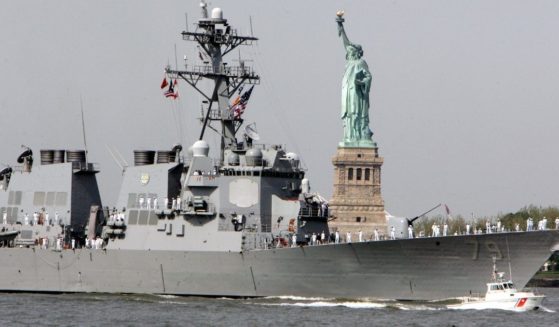 A U.S. Navy guided-missile destroyer is pictured in a 2007 file photo sailing past the Statue of Liberty in New York Harbor.